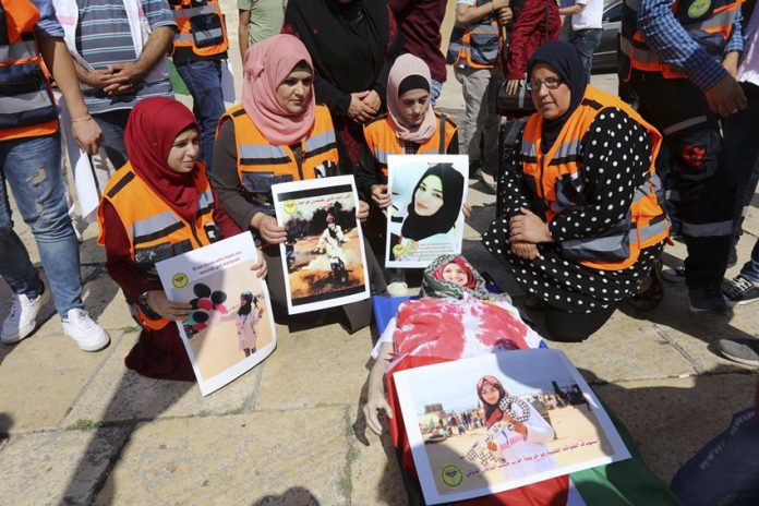 Palestinians in Bethlehem commemorate Razan al-Najjar, the 21-year-old Palestinian volunteer  paramedic, shot dead in Gaza by an Israeli sniper on the border with Israel on June 1st