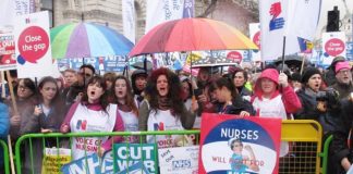 Nurses demonstrate outside Downing Street in defence of the NHS