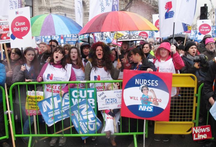 Nurses demonstrate outside Downing Street in defence of the NHS
