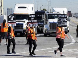 Teamster union port workers demonstrating against ‘misclassification’ – the New Jersey Attorney General has lodged a complaint against ‘misclassification’