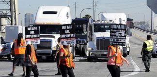 Teamster union port workers demonstrating against ‘misclassification’ – the New Jersey Attorney General has lodged a complaint against ‘misclassification’