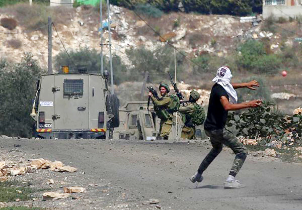 Israeli state forces clash with Palestinian youth in the West Bank