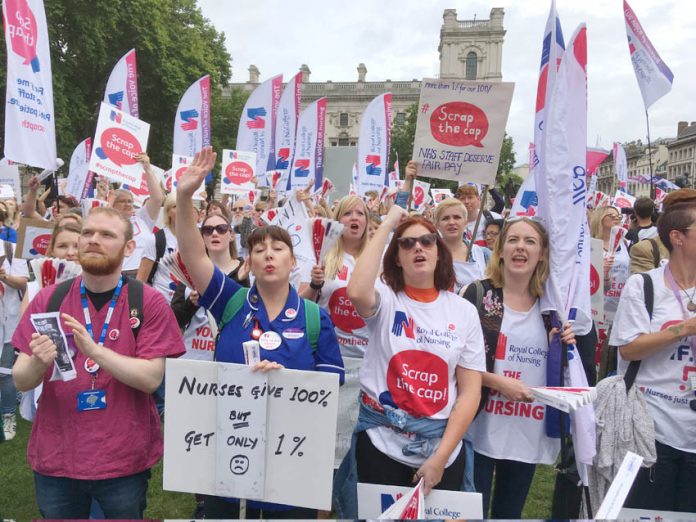 Nurses demonstrate in Parliament Square against the pay cap