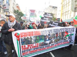 Banner on the ‘Justice Now’ demonstration in London earlier this year demanding a boycott of Israel