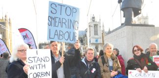 Labour Party supporters of Jeremy Corbyn protesting at the right-wing witch-hunt against him