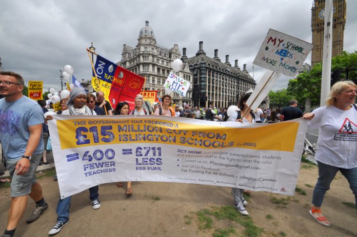 London schools demonstration outside parliament against funding cuts