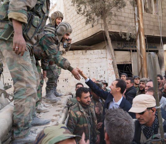 Syrian President BASHAR AL-ASSAD greeted by his troops in Ghouta after they liberated the region from terrorists – they are now preparing to take Idlib