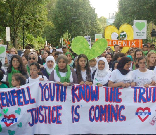 Youth marching on the mass march on the anniversary of the Grenfell fire – TUC delegates demand flammable cladding is banned