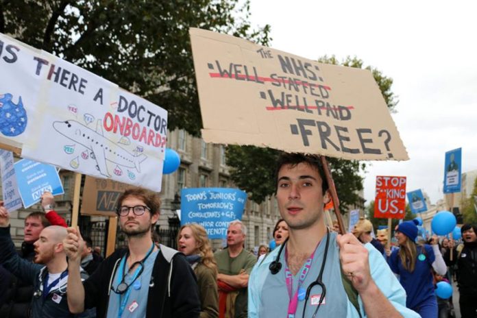 Junior doctors on a demonstration fighting against cuts and for better wages for NHS staff – there is another winter crisis looming