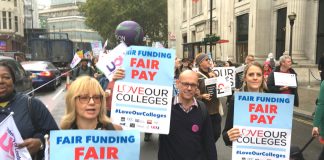 Demonstrators show their determination to get wage rises that match or are bigger than the rate of inflation