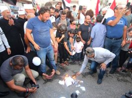 Syrians in the occupied Golan Heights burn ballot papers declaring the election void due to the Israelis illegal occupation
