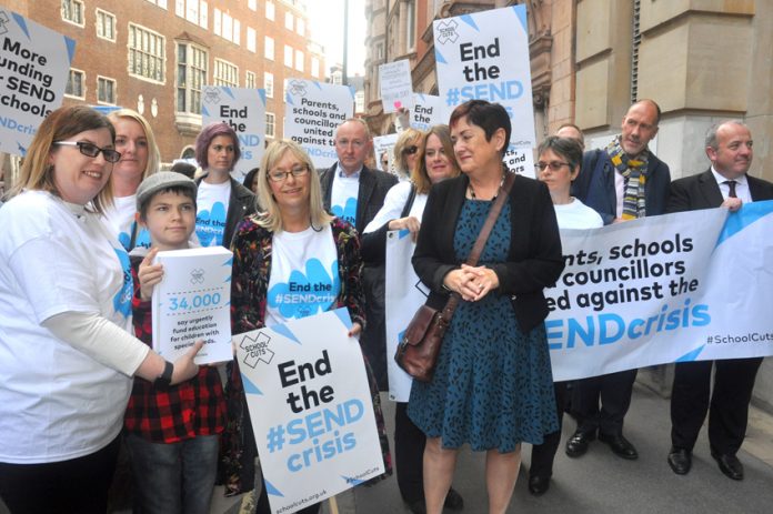 NEU joint general secretary MARY BOUSTED (centre) leads a delegation of six unions, parents, pupils and councillors to present a petition demanding proper funding for Special Educational Needs and Disability pupils to the Department of Education