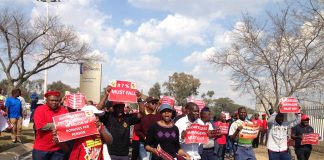 Demonstrators on the march against Eskom, which is being milked by privateers