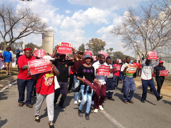 Demonstrators on the march against Eskom, which is being milked by privateers