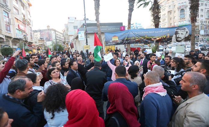 Palestinians rally in Ramallah in solidarity with Gaza after the Israeli bombardment