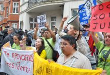 Assange supporters demonstrating outside the Ecuadorian embassy in London against attempts to extradite Julian Assange