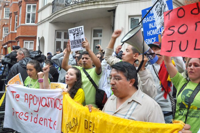 Assange supporters demonstrating outside the Ecuadorian embassy in London against attempts to extradite Julian Assange