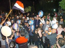 Residents in Suwayda Province demonstrate their support for President Assad and wave their national flag in the freed city of Suwayda