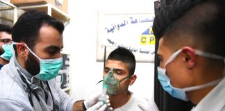 A young victim of the terrorist gas attack in Aleppo is treated in hospital