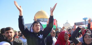 Palestinians demonstrate in Jerusalem against US president Trump after he announced the moving of the US embassy to Jerusalem