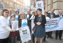 MARY BOUSTED leads a protest of teachers and pupils demanding more funding for pupils special needs – many more are in poverty