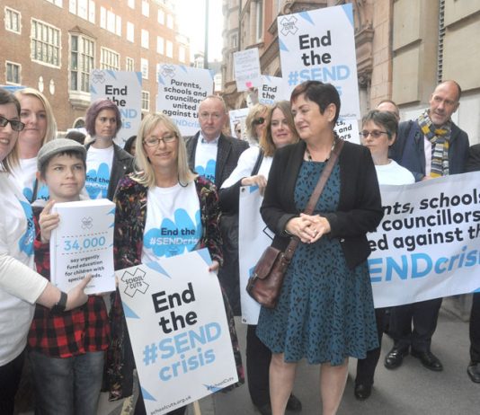 MARY BOUSTED leads a protest of teachers and pupils demanding more funding for pupils special needs – many more are in poverty