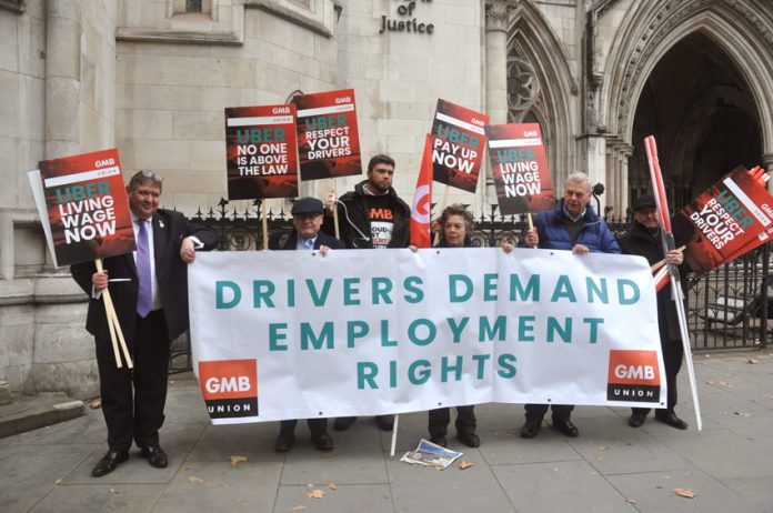 GMB members demonstrate outside the High Court as their case against UBer is heard in October this year
