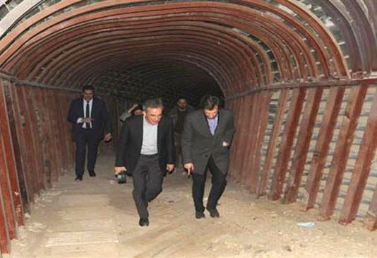 A French delegation led by Thierry Mariani inspects a tunnel dug by terrorists in the city of Duma