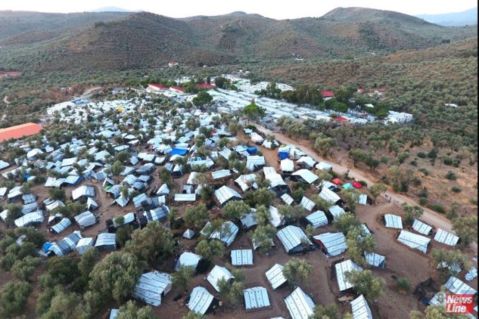 An aerial view of a makeshift settlement next to Moria camp on the island of Lesvos (Credit and copyright Giorgos Moutafis)