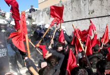 Riot police attack students on the stairs to the Vouli (Greek parliament) building in Athens last Thursday. Photo credit: MARIOS LOLOS