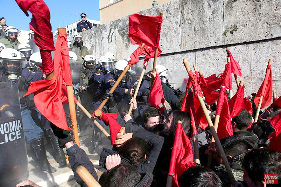 Riot police attack students on the stairs to the Vouli (Greek parliament) building in Athens last Thursday. Photo credit: MARIOS LOLOS