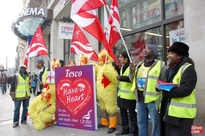 Unite Tesco supply workers protest outside a store in central London – 9,000 jobs are threatened as the company seeks to save £1.5bn