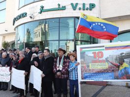 Palestinians march in support of President Maduro Venezuelan flag flies in Ramallah – solidarity demonstration outside the Venezuela Office of Representation of the Bolivarian Republic of Venezuela