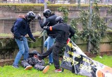 French police kick a yellow vest demonstrator – the movement has inspired German workers to take to the streets
