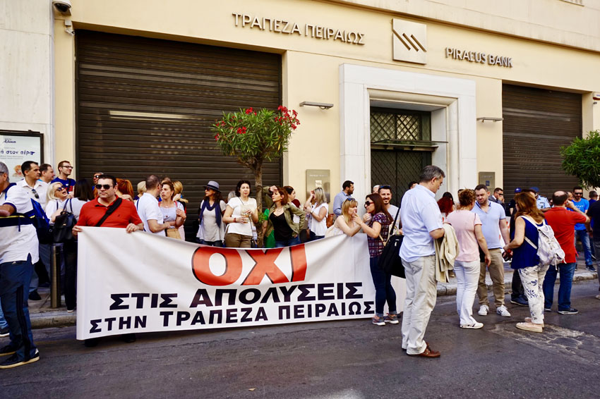 Bank workers on the picket line outside Piraeus bank in central Athens during their national strike last Friday