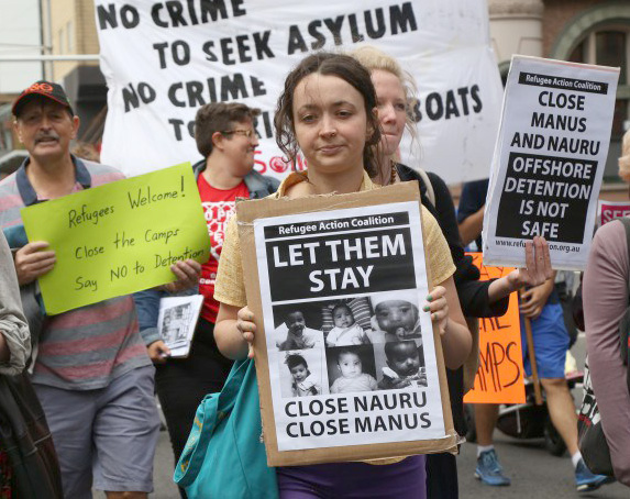 AUSTRALIA, Sydney: Thousands of Australian have taken to the streets during a protest demanding that refugees not be sent back to Nauru or Manus Island on March 20, 2016 (AAP Image/NEWZULU/Richard Milnes)