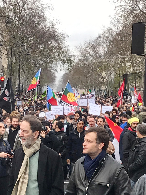 Masses of striking French workers marching through the Bastille district of Paris on 17 December 2019