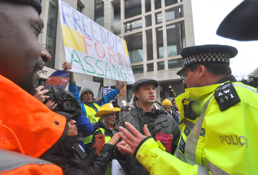 Protesters outside Westminster Magistrates Court, London, England demanding WikiLeaks founder Julian Assange be released from Belmarsh prison – 150 prison staff are feared to have the coronavirus